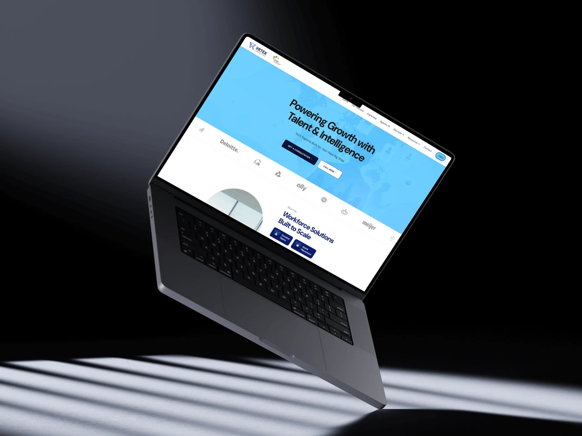 VRTek Consulting website shown on an angled laptop mockup, designed and built by VRTek Consulting